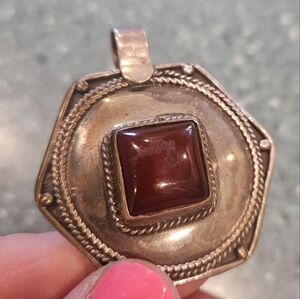 Elegant Silver and Brown Pendant